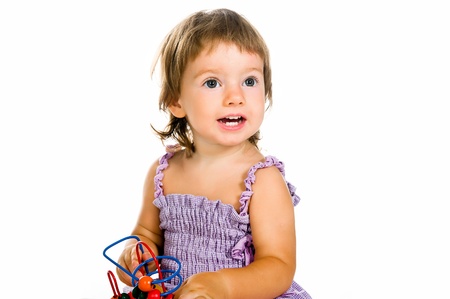 small baby with developmental toyの写真素材