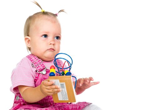 small baby with developmental toyの写真素材