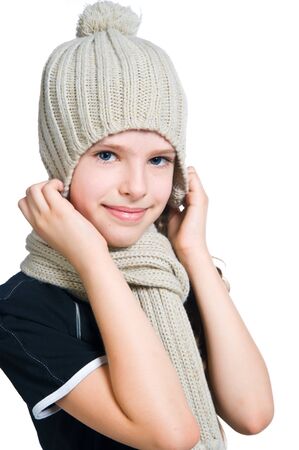 Little girl in cap and scarfの写真素材