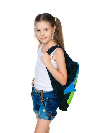 Cute school child with knapsackの写真素材