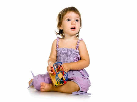 Small baby with developmental toyの写真素材