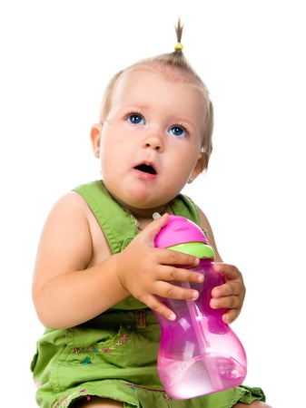 Little girl with the bottle of waterの写真素材