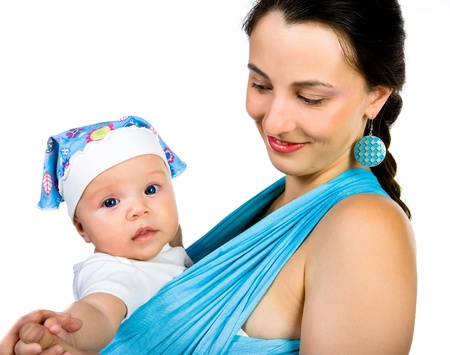 Mother carrying her baby in a slingの写真素材