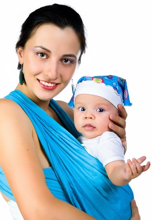Mother carrying her baby in a slingの写真素材