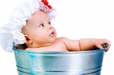 Baby on a bucketの写真素材