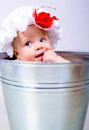baby on a bucketの写真素材