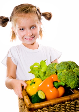 Little girl with the vegetablesの写真素材