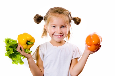 Little girl with the vegetablesの写真素材