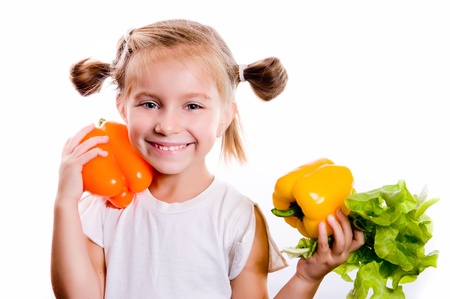 Little girl with the vegetablesの写真素材
