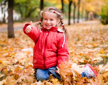 Autumn portrait of a  little girlの写真素材