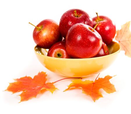 Apples in a yellow bowlの写真素材