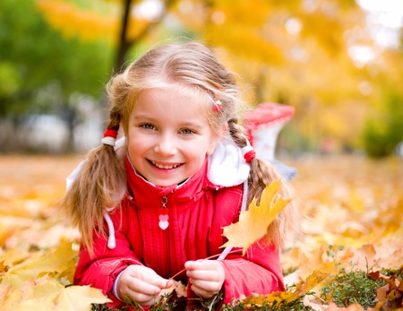 Autumn portrait of a  little girlの写真素材