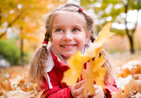 Autumn portrait of a  little girlの写真素材