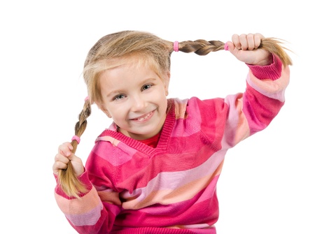 Cute little girl with a plaitsの写真素材