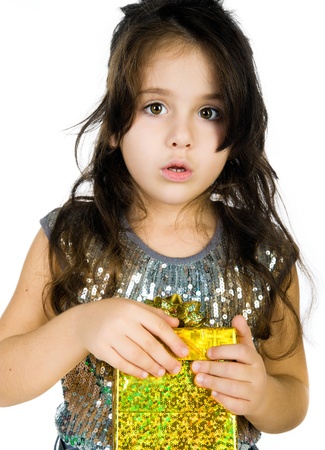 Cute girl with a giftの写真素材