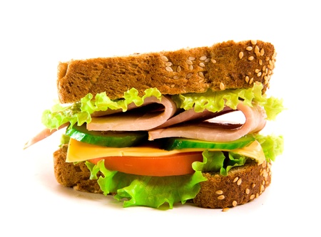 Ham and cheese sandwich with lettuce and tomatoes, isolated on whiteの写真素材