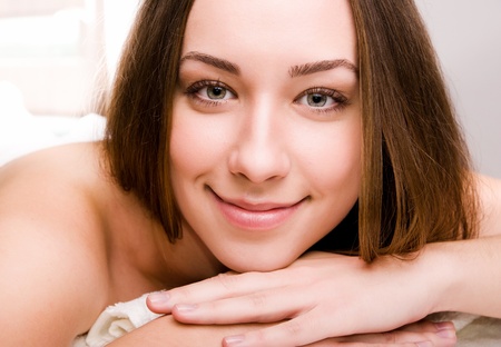 Pretty young women relaxing in the spa salonの写真素材