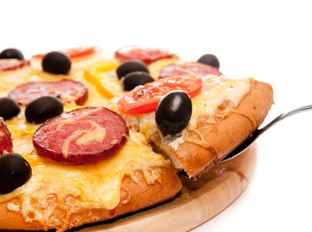 Pizza over a white backgroundの写真素材