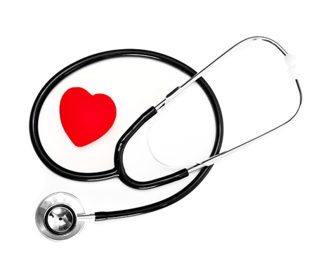 stethoscope and a red heart over a white backgroundの写真素材
