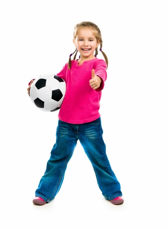 Little girl  with the ball over white backgrounfの写真素材