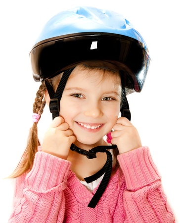 Cute girl in crash helmet on a white backgroundの写真素材