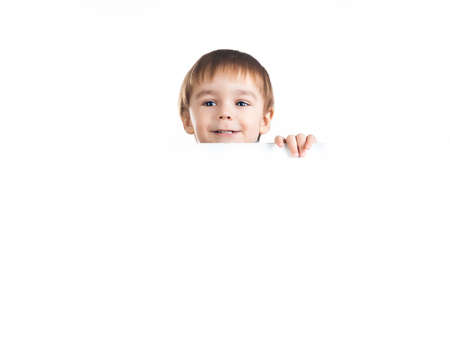 Cute little boy ower a white backgroundの写真素材