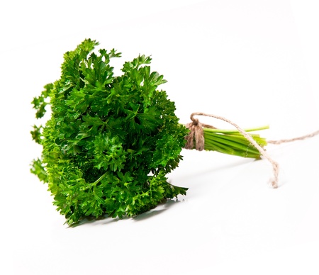 Fresh leaf of parsley  on white backgroundの写真素材
