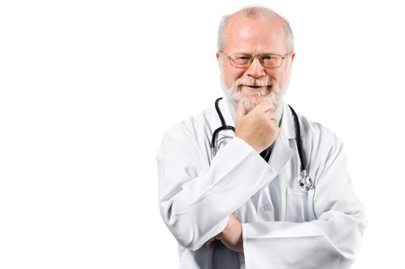 Portrait of confident senior medical doctor on clinic backgroundの写真素材