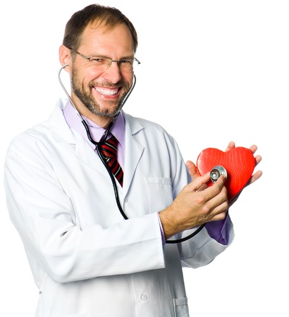 medical doctor holding red heart symbol on white backgroundの写真素材