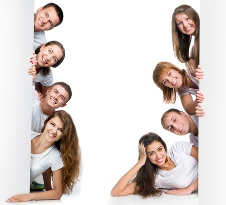 Group of pretty young people looking out white board