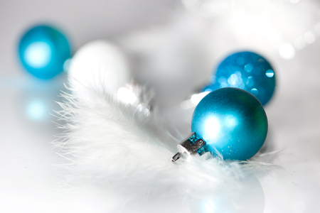 blue spheres against lights blurred backgroundの写真素材