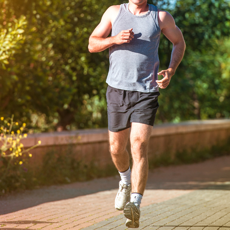 Running athlete man  Male runner outdoorsの写真素材