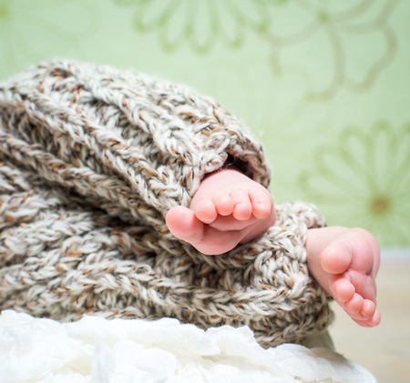 Little fingers. Newborn baby's legsの写真素材
