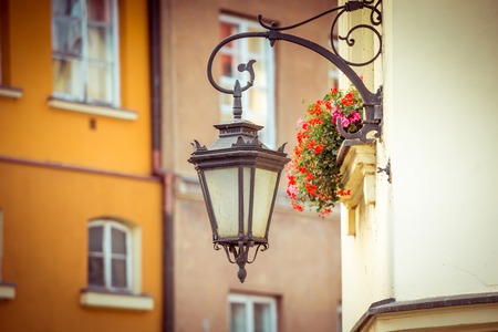 Old lantern on a vintage style backgroundの写真素材