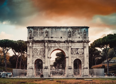 Perspective of the Arch of Constantine in Rome at nightの写真素材