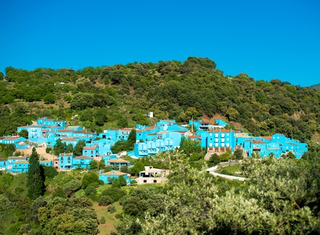 Juzcar, blue Andalusian village in Malaga, Spain. village was painted blue for The Smurfs movie launchの写真素材