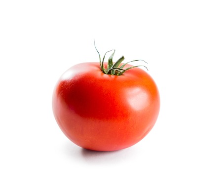 Fresh red tomato with green stem on white backgroundの写真素材