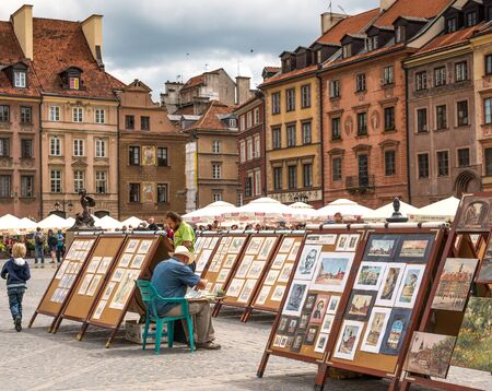 WARSAW, POLAND - JUNE 20, 2015:  Street in the old town near the market square. A popular place among tourists in June 20, 2015 in Warsaw, Poland.のeditorial素材