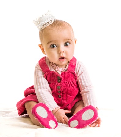 cute six-month girl in costume princessの写真素材