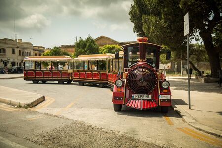 MEDINA, MALTA - MAY 26: Excursion train in the historical part of the city. Medina, Malta on May, 26...