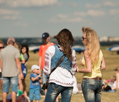 UKRAINE, KHARKIV -AUGUST 24: people watching airshow on Kharkiv aerodrome on Ukraine Independence Day  in Kharkiv on August 24, 2015のeditorial素材
