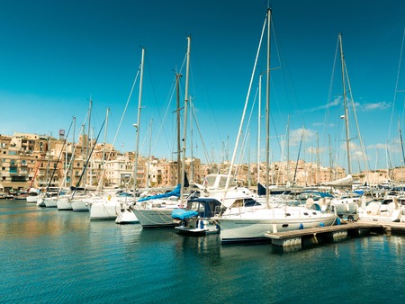 The big harbor of the city Valetta, Malta with modern yachtsの写真素材