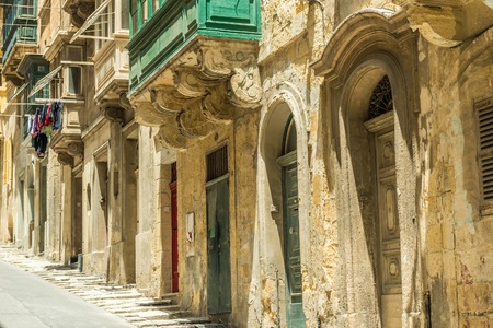 cityscape with old doors in Valletta, Maltaの写真素材