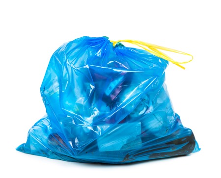 blue garbage bag with trash isolated on whiteの写真素材