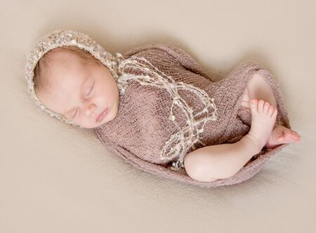 cute sleeping newborn girl close-upの写真素材