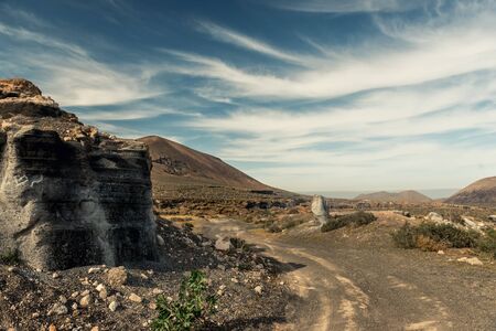picturesque view of Lanzarotte desert with cliffsの写真素材
