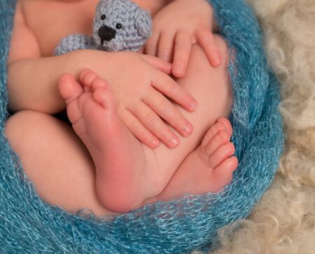 Toes and fingers of a newborn, closeupの写真素材
