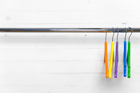 Colorful clothes hangers on the sideの写真素材