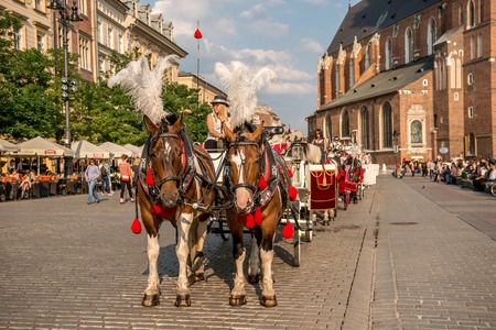 Carriage with horses, cobbled streets of Krakowのeditorial素材