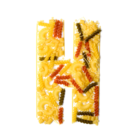 Pile of spaghetti forming a letter Hの写真素材